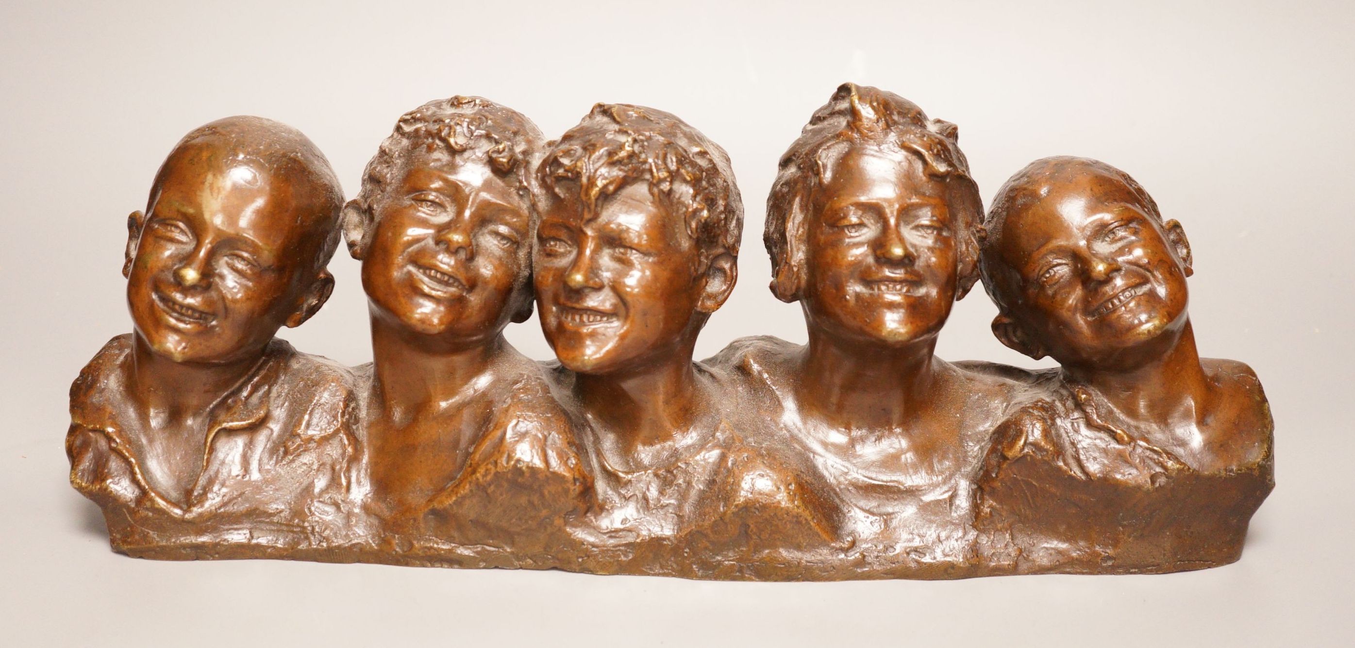 Vincenzo Aurisicchio, (Napoli 1855-1926) a bronze bust group of five smiling children, signed to reverse 40cm wide
